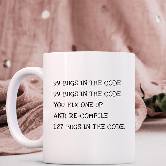 Humorous Bug Fixer Mug — Developer Coffee Cup with '99 Bugs' Code Joke